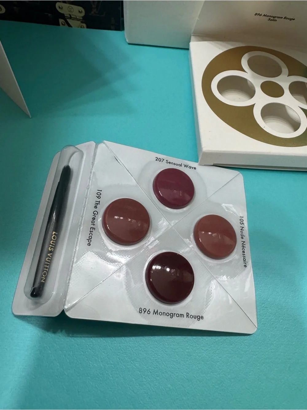 Louis Vuitton La Beauté Lip Quartet — White & Gold Packaging with Pink Tones